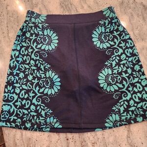 Talbot navy skort with teal designs. Like new, size med p. Elastic weist.